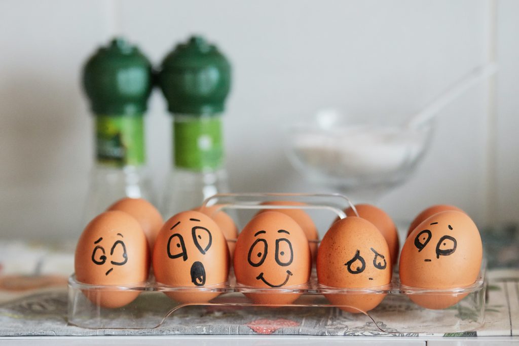 eggs with funny faces drawn on 
